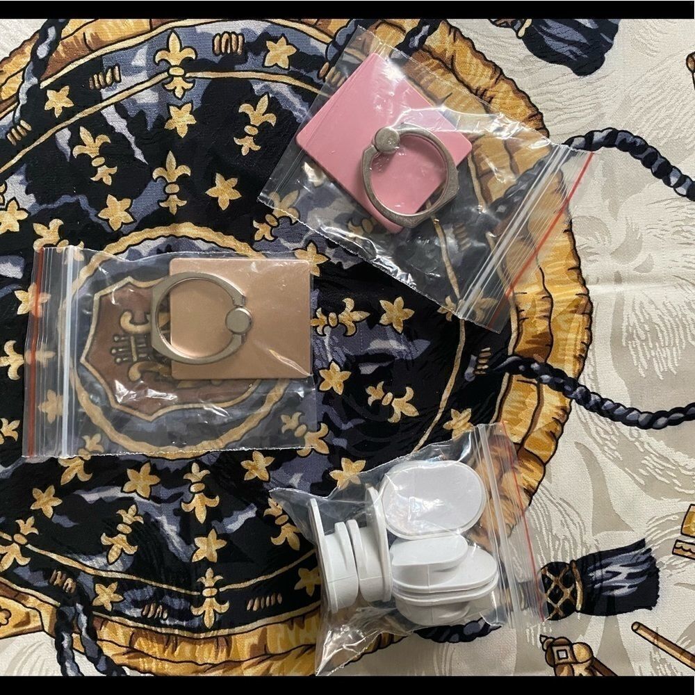 Cell phone rings & hooks bundle. Comes with several stick ons for hangers.